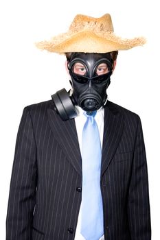 Picture of a man in a suit and gasmask and wearing sunglasses..