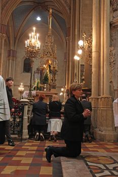 ZAGREB, CROATIA - APRIL 11: On Holy Saturday, people pray in front of God's tomb in the Zagreb Cathedral, April 11, 2009 in Zagreb, Croatia.