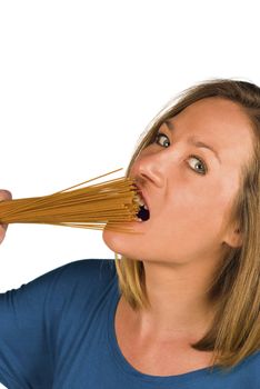 Wopman biting into uncooked whole wheat pasta