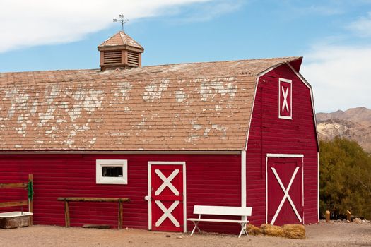 Old Red Barn with Bench and Well