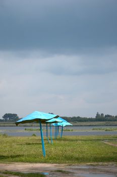 An image of umbrellas on the beath