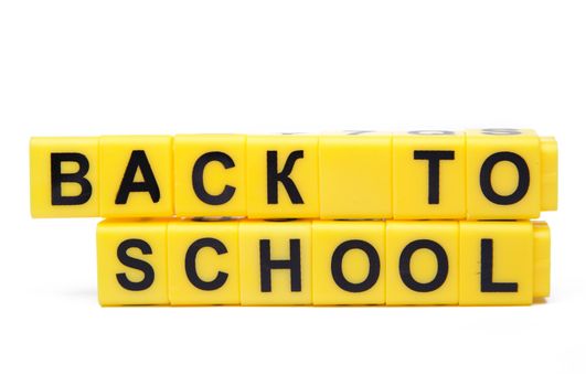 An image of yellow bricks with words ''back to school'' on them