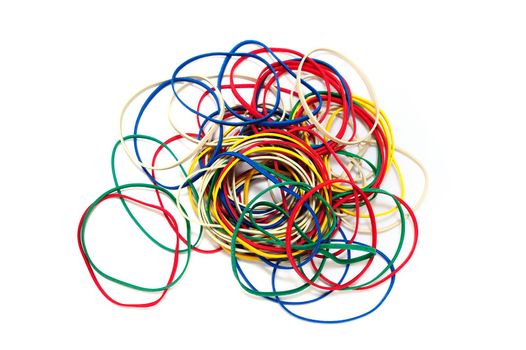 A pile of color rubber bands on a white background.