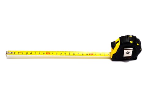 Extended retractable tape measurer on a white background 