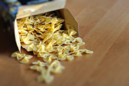 An image of pasta on the kitchen table