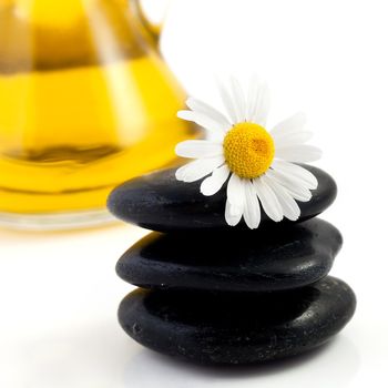 An image of a heap of black stones for spa massage