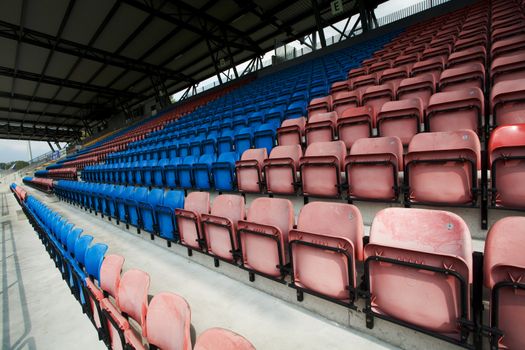 An image of empty seats of the stadium
