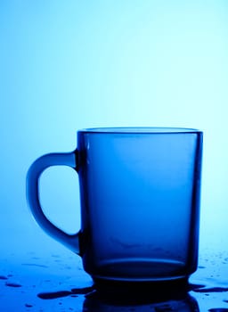 An image of a cup on blue background