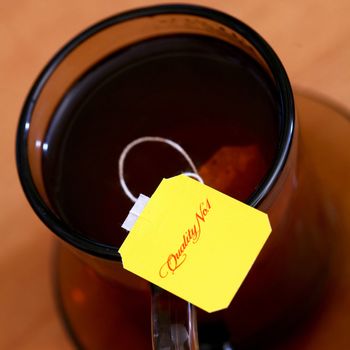 An image of yellow label on background of cup