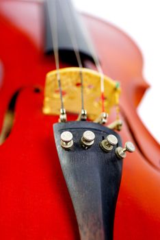 Close-up of a classic violin isolated on white background 