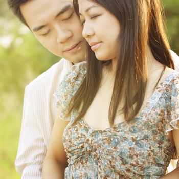 Loving Couple at outdoor during sunset