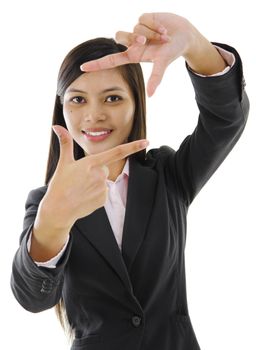 Mixed race Asian woman showing perspective hand sign