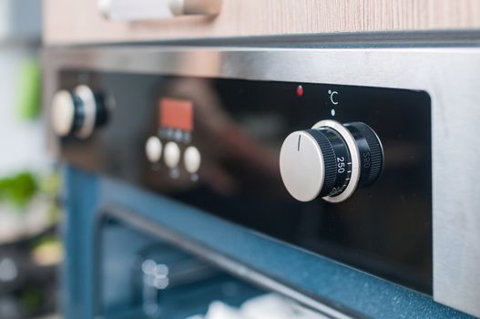 controls on the oven for a close-up