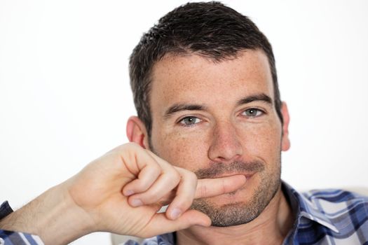 portrait of handsome young man in studio