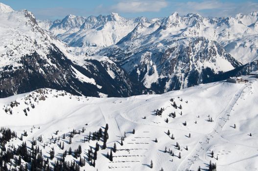 Beautiful winter mountain panorama with ski slopes in Montafon, Austria