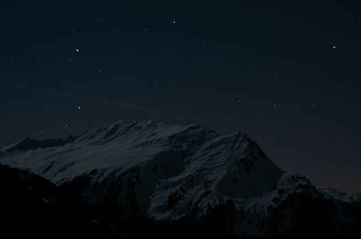 Night panorama of Montafon, Austria with great starry sky