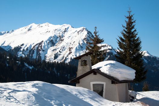 small chapel in skiing resort in the mountains of Montafon, Austria