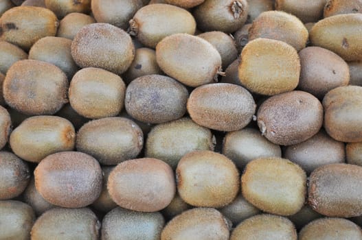 Kiwifruit aka kiwi, green edible berry fruit