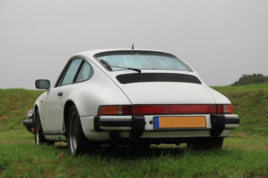 Classic white sportscar on the grass, German brand