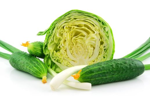 Ripe Cabbage, Cucumbers and Onion Isolated on White Background