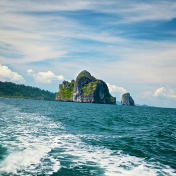 tall cliff with trees at Andaman Sea, Thailand