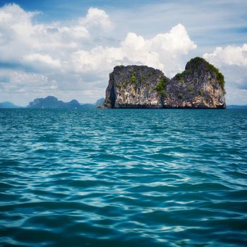 tall cliff with trees at Andaman Sea, Thailand