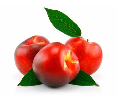 Ripe Peach (Nectarine) with Green Leafs Isolated on White Background