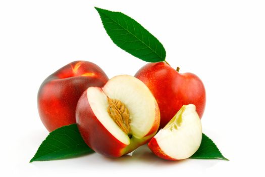 Ripe Sliced Peach (Nectarine) with Green Leafs Isolated on White Background