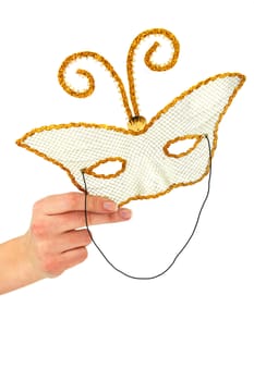 Female hand holding masquerad mask isolated on a white background