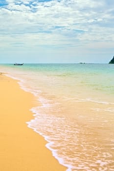 sunny beach, blue ocean and clean sky