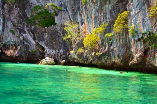 people snorkeling near Marakot Cave, Andaman Sea, Thailand