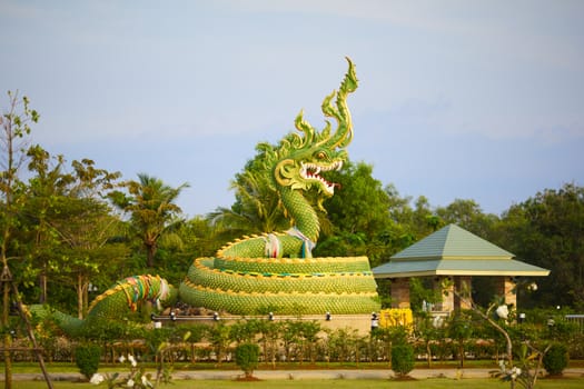 green water dragon statue in Krabi, Thailand