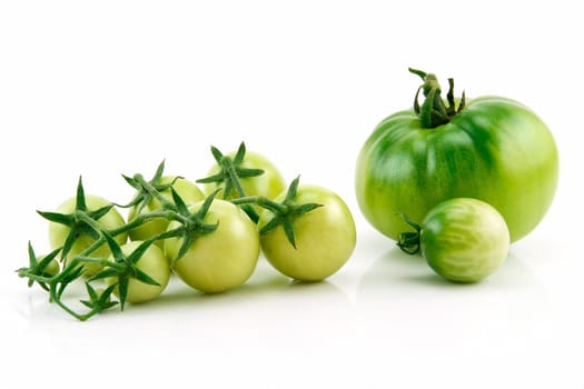 Bunch of Ripe Yellow and Green Tomatoes Isolated on White Background