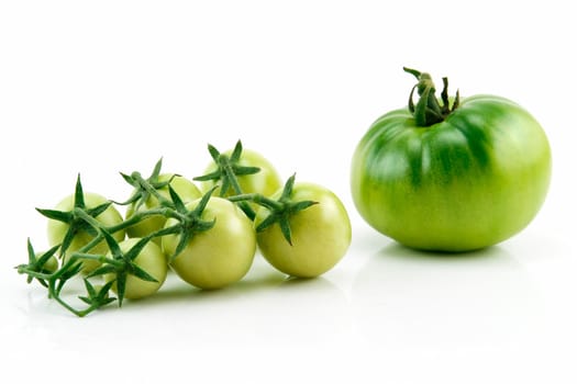 Bunch of Ripe Yellow and Green Tomatoes Isolated on White Background