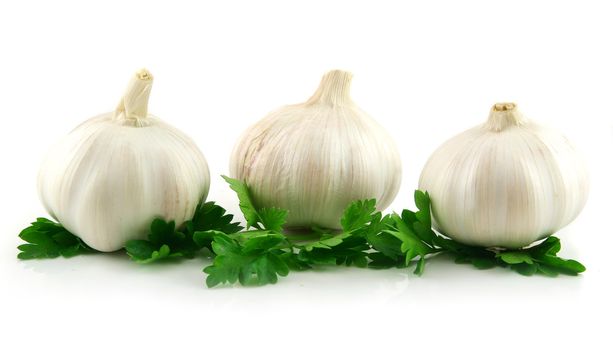 Garlic Vegetable with Green Parsley Leaves Isolated on White Background