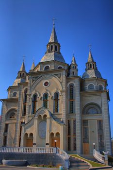 Church on a blue sky background. HDR image.