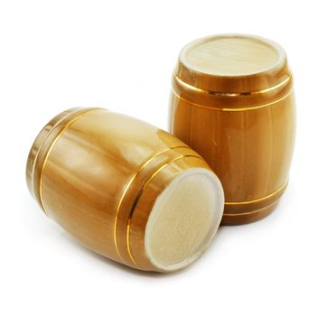 Gold tuns from wine cellar isolated on a white background