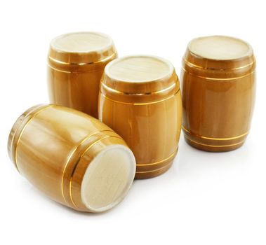 Gold tuns from wine cellar isolated on a white background