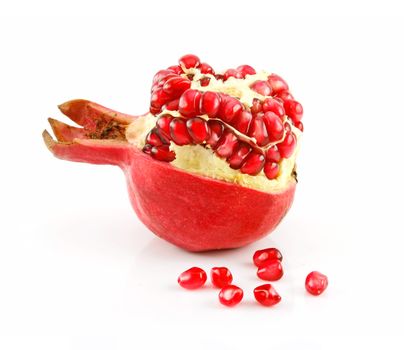 Ripe Pomegranate Fruit with Seeds Isolated on White Background