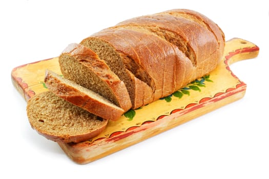 Whole wheat bread on the table wooden board isolated on a white background