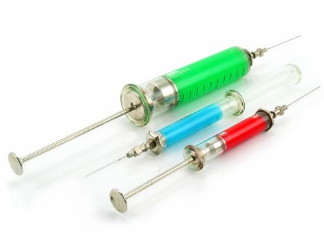 Three syringes with toxic substance isolated on a white background