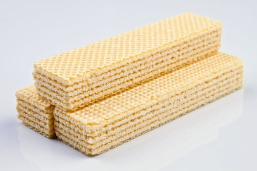 three wafers in a pile on white background