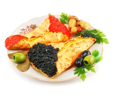 Dish with caviar-stuffed pancakes isolated on a white background