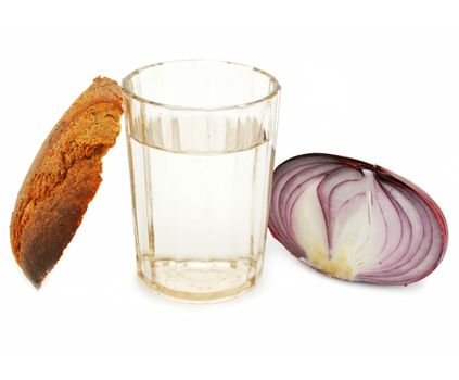 Crust of bread, glass of alcohol and onion isolated