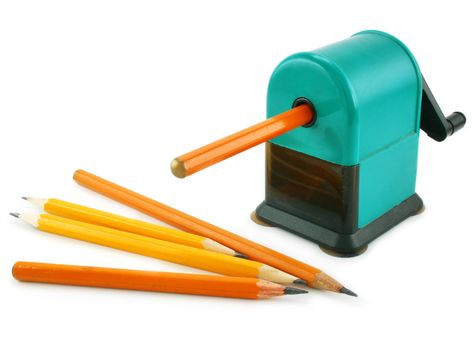 Grinding manual machining mechanical pencil sharpener and pencils isolated on a white background
