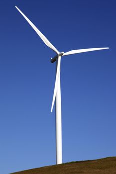 Wind turbine rotating through the air and generating power, WA., state.