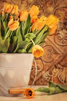 Yellow tulips with vintage grunge background