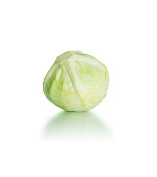 Head of cabbage on white background with reflection. Clipping path is included