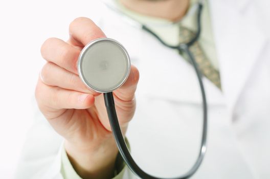 An image of a stethoscope in doctor's hand