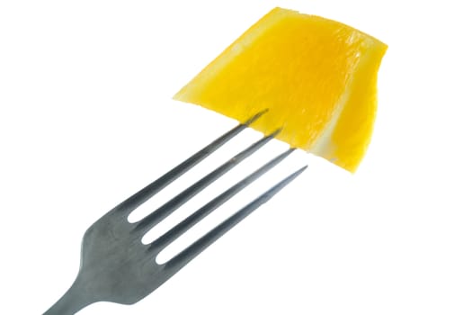 Stock photo: an image of yellow paprika on the fork